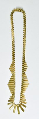 Lot 792 - An 18ct yellow gold Cleopatra-style necklace,...