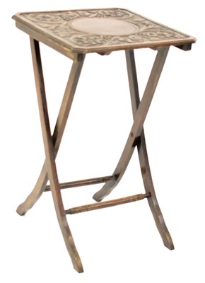 Lot 25 - An early 20th century carved oak folding side...