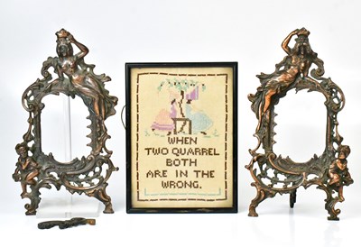 Lot 224 - A pair of Art Nouveau relief decorated easel...