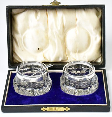 Lot 585 - WOLFSKY & CO LTD; a pair of George V silver...