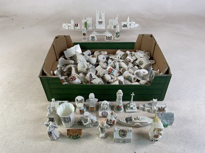 Lot 265 - A large quantity of crested china, with...