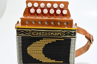 Lot 1062 - CASTAGNARI; a Giordy melodian, with soft case.