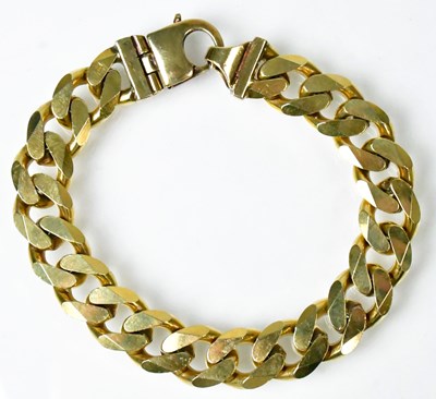 Lot 771 - A 9ct yellow gold heavy curb link bracelet,...