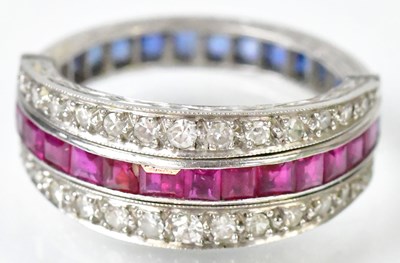 Lot 766 - A white metal metamorphic ring, the main band...