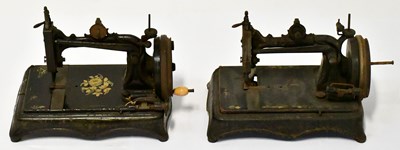 Lot 242 - HOWE; two vintage sewing machines, comprising...