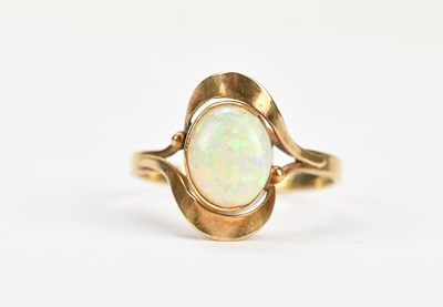 Lot 562 - An early 20th century yellow metal opal set...