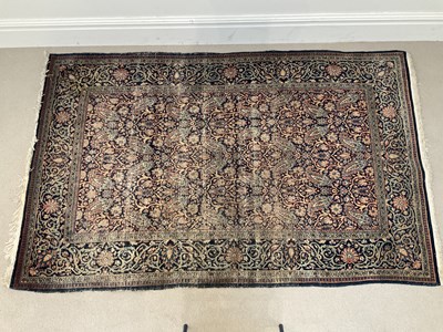 Lot 1412 - A decorative Eastern William Morris style rug...