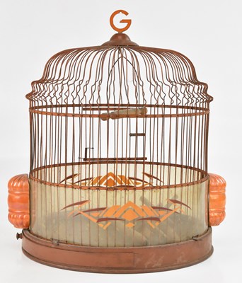 Lot 517 - A vintage bird cage with ceramic feeders,...