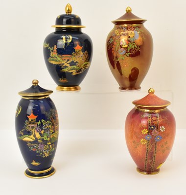 Lot 159 - Two chinoiserie-style temple jars on a rouge...