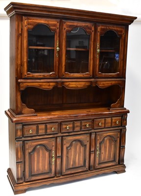 Lot 13 - A reproduction dresser, the moulded cornice...