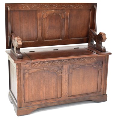 Lot 7 - A reproduction oak monk's bench, with box seat...