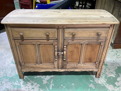 Lot 692 - ERCOL; a sideboard from the 'Old Colonial'...