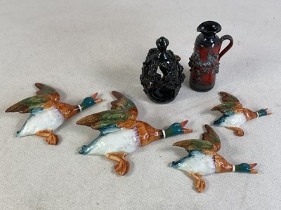 Lot 295 - BESWICK; a set of four flying ducks, largest...