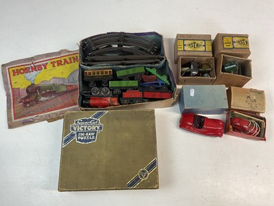 Lot 112 - A group of vintage toys comprising a Hornby...