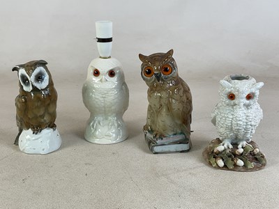 Lot 662 - Four ceramic table lamps in the form of owls,...