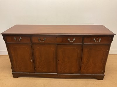 Lot 803 - A reproduction mahogany side board with twin...