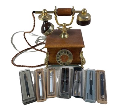 Lot 59 - A reproduction British Telecom phone, with...