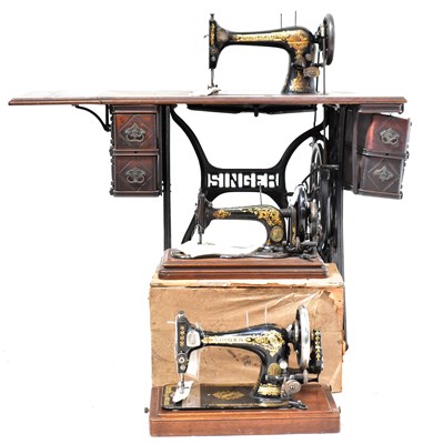 Lot 240 - SINGER; two vintage hand sewing machines and a...