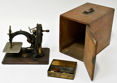 Lot 247 - WILCOX & GIBBS; a hand sewing machine (serial...