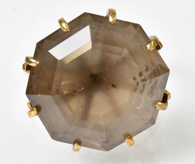 Lot 739 - A 9ct yellow gold cocktail ring set with a...