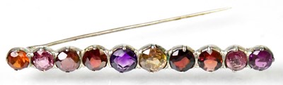 Lot 791 - A white metal brooch set with multicoloured...