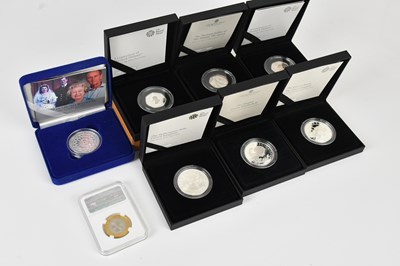 Lot 662 - THE ROYAL MINT; a collection of eight silver...