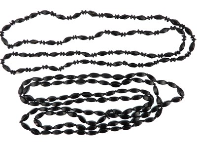 Lot 1038 - Two 19th century jet necklaces, one a...