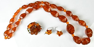 Lot 880 - An amber necklace of graduated faceted beads,...