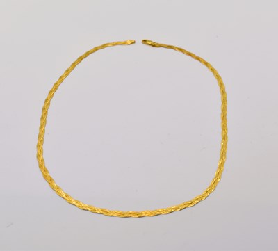 Lot 600 - A 9ct gold semi-rigid necklace, length 17.5cm,...
