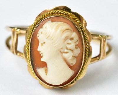 Lot 760 - A yellow metal ring set with a cameo, size M,...