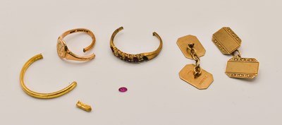 Lot 575 - A pair of 9ct gold cufflinks, a cut 9ct gold...