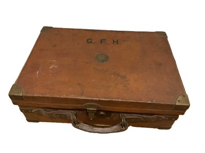 Lot 25 - An oak and leather cartridge case, initialled...