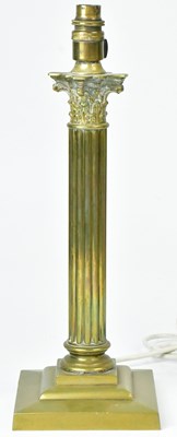 Lot 90 - A brass table lamp in the form of a Corinthian...
