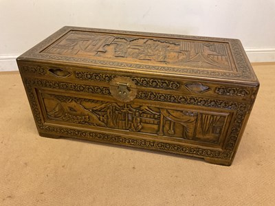 Lot 18 - A Chinese camphor wood chest, with carved...