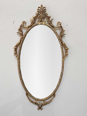 Lot 2087 - A gilt framed oval wall mirror, length 83cm.