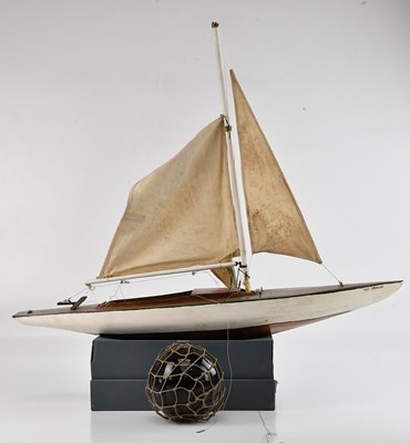 Lot 2203 - A model pond yacht, length 74cm, height approx...