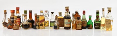 Lot 2480 - MINIATURES; a collection of assorted alcohol...