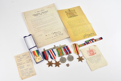 Lot 2276 - A collection of WWII related medals and...