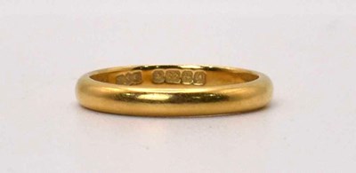 Lot 583 - A 22ct gold wedding band, size L, 3.2g