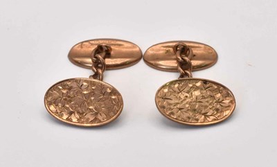 Lot 602 - A pair of 9ct gold oval faced cufflinks, 4.3g.