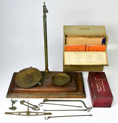 Lot 338 - A vintage set of wood and brass pharmacy...