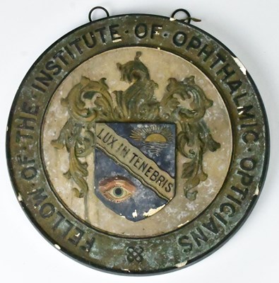 Lot 343 - An early 20th century plaster plaque, for...