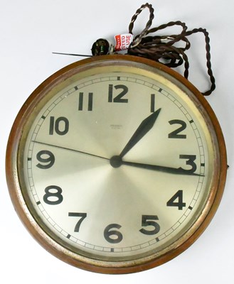 Lot 110 - A Synchromatic Electric wall clock, metal dial...