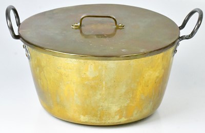 Lot 220 - A twin-handled brass jam pan, 18 x 27cm.
