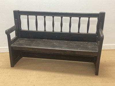 Lot 790 - A Georgian oak settle bench with spindle back...