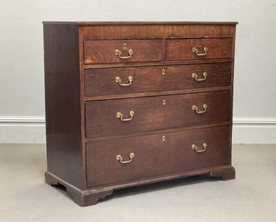 Lot 1113 - A George III inlaid oak chest of two short...