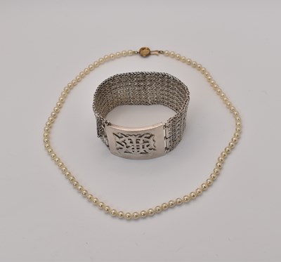 Lot 613 - A Victorian silver bracelet, 65.1g, together...