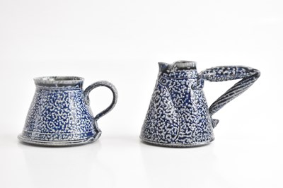 Lot 1583 - MARK SMITH; two studio pottery mugs, one...