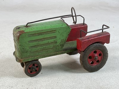 Lot 117 - A vintage wooden painted model of a tractor,...