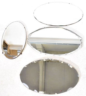 Lot 71 - Four oval Art Deco wall mirrors, all with...